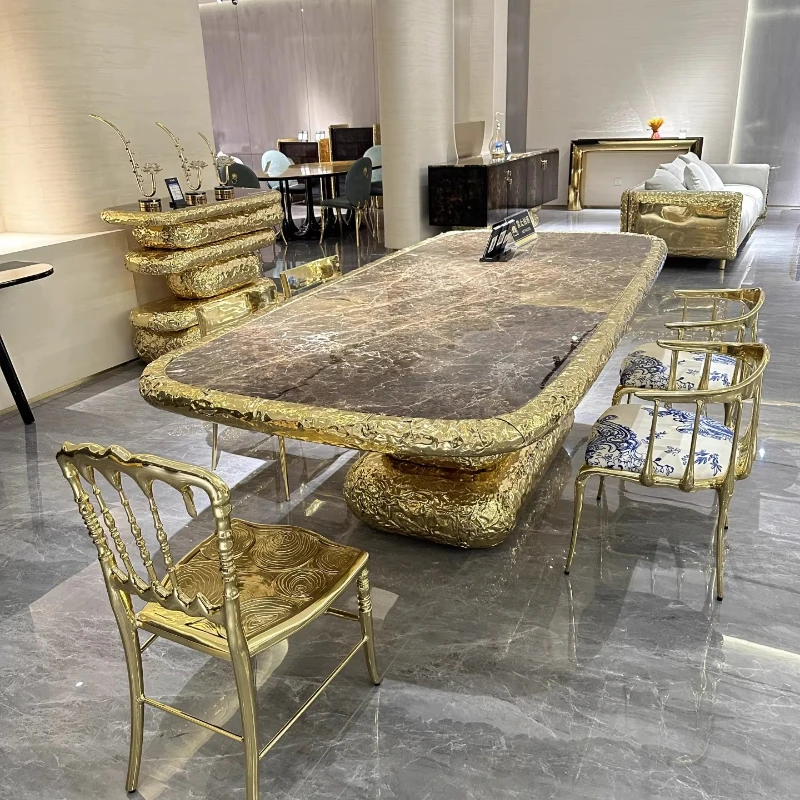 

Marble light villa oval table brass dining table Italian dining table