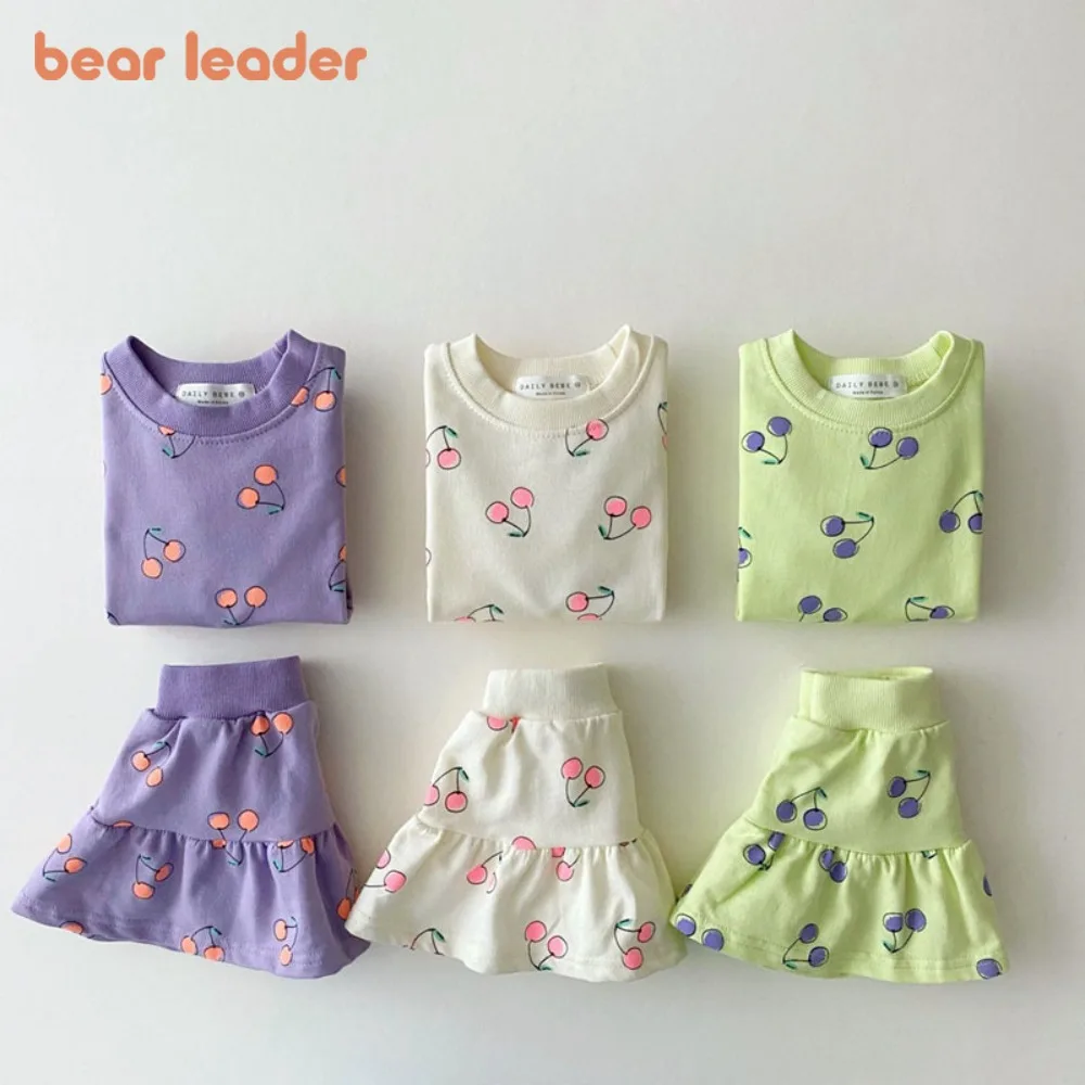 Bear Leader Koreanische Kinderkleidung 2026 Neue Mädchen-Sommerkleidung Niedliches Kirschmuster Baby-Mädchen-Set Kurzärmeliges Oberteil + Kurzer Rock