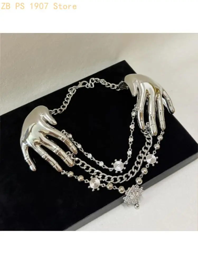 Sculpted Hand Statement Necklace with Multiple Draped Chains and Bead 55KA