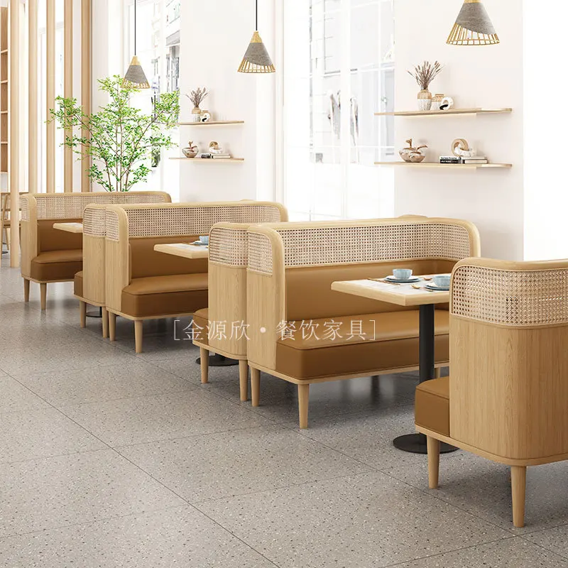 Customized theme restaurant Solid wood braided rattan table and chair combination Cafe tea restaurant Wall card seat Sofa table