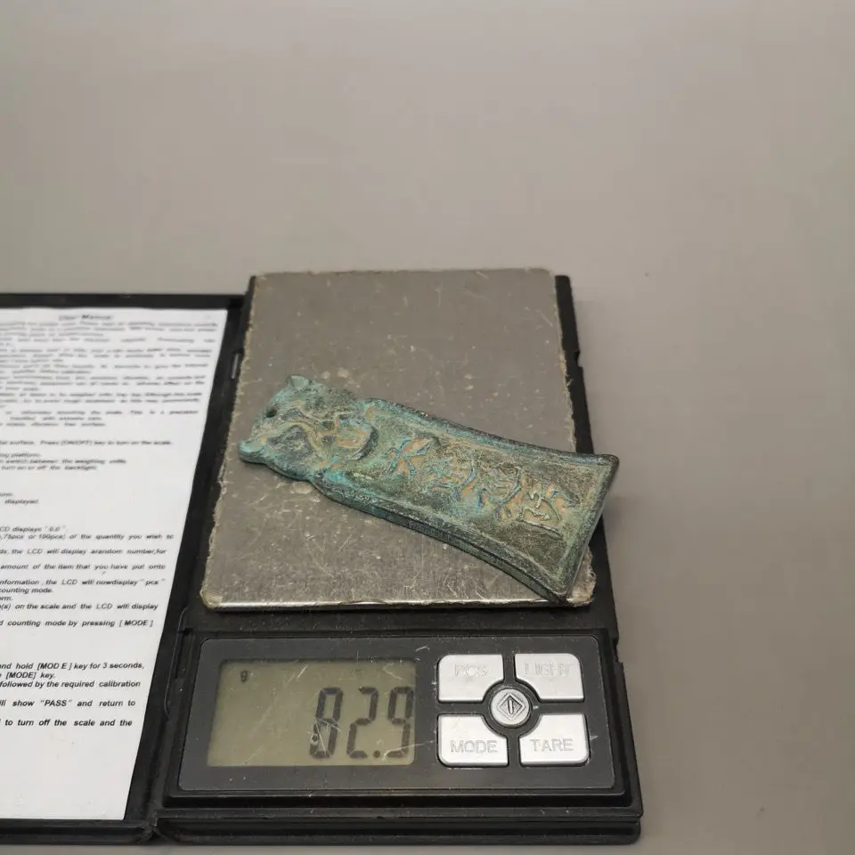 Copper token, heavy in shape and correct in shape; the whole body is light, elegant in color and ancient
