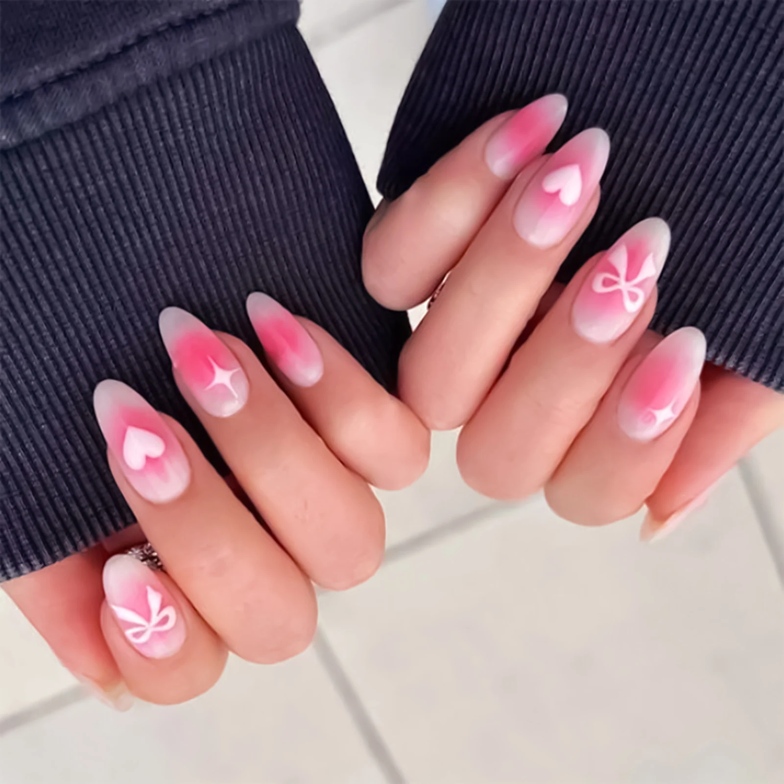

Blush Pink Almond Fake Nails Love Heart Bowknot Star Printed Acrylic Nails Press On 24Pcs Full Cover False Nails for Manicure