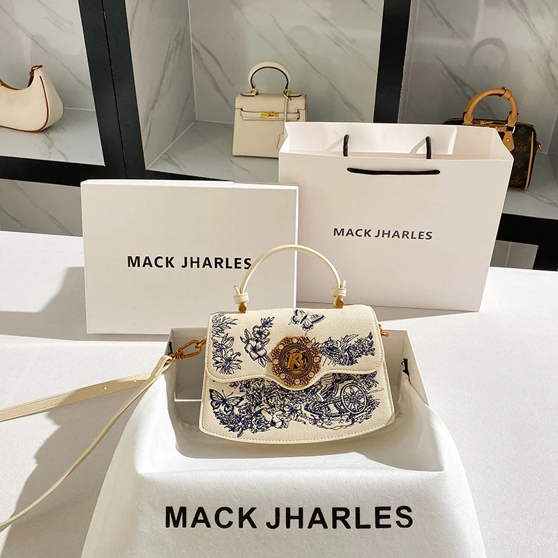 

New Chinese-style heavy embroidery handbag with a high-end feel for middle-aged mothers