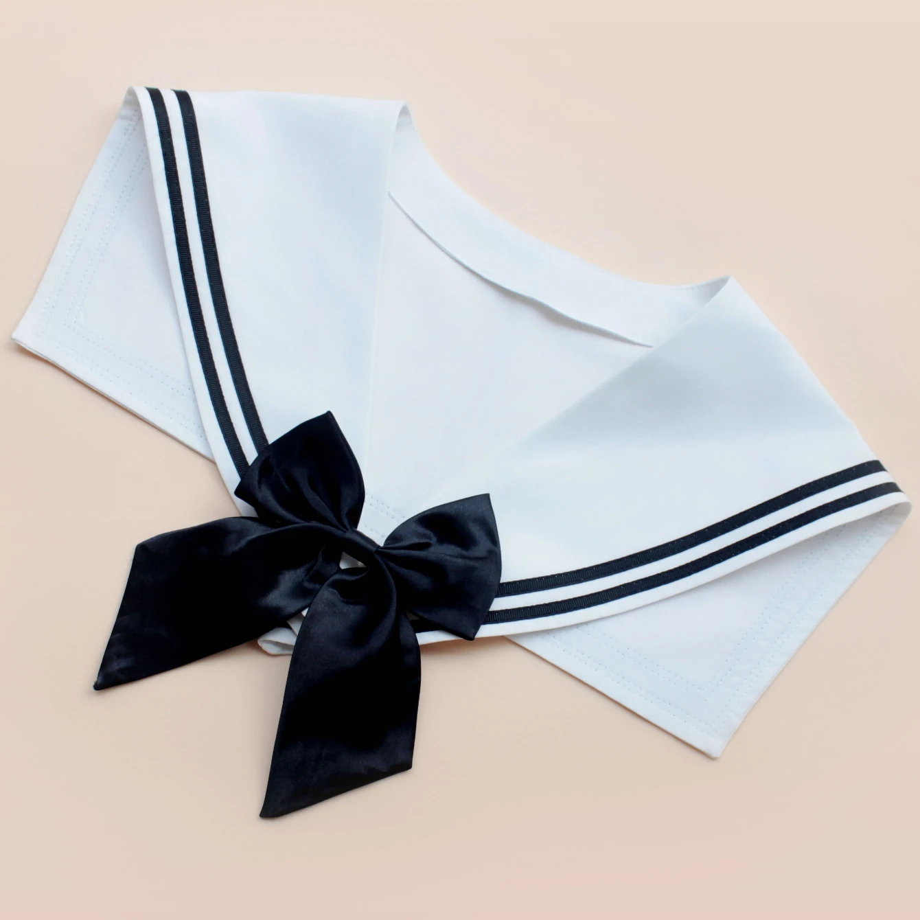 Fashionable shawl. Elegant sailor outfit. Bowknot embellishment shows soft temperament. Fashionable and versatile. High-end qual