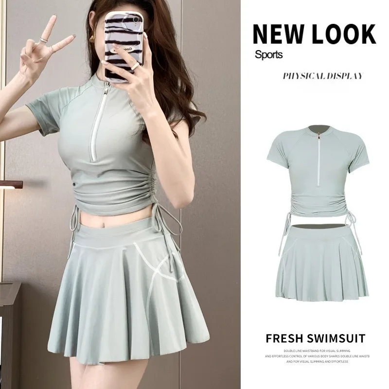 

Athletic Two Piece Swimsuit Set with Half Zip Short Sleeve Top Ruched Side Tie Skirt Modest Swimwear for Beach Pool Training