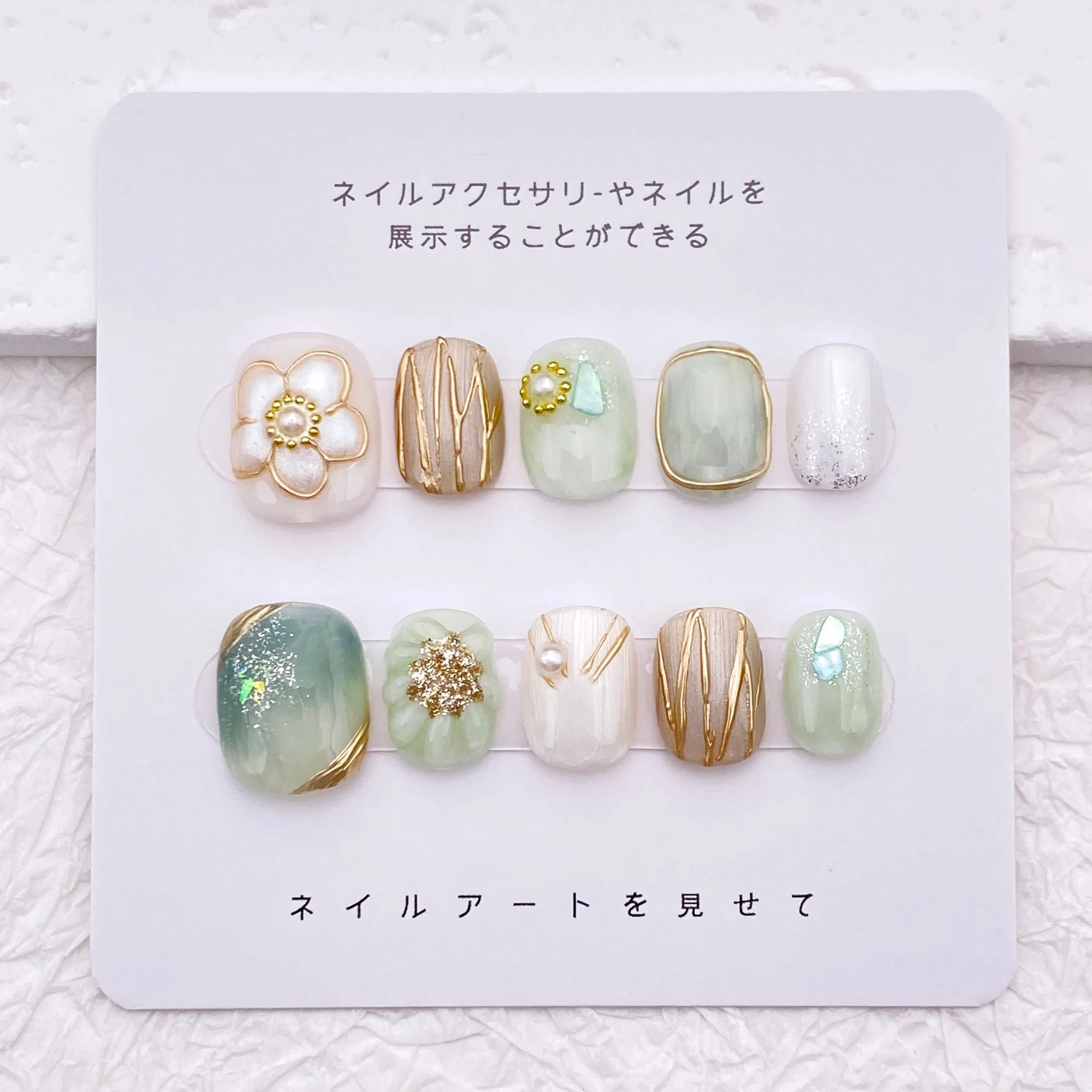 

Playful and cute spring flower nail art, light green gradient line custom nail art, reusable high-quality nail art