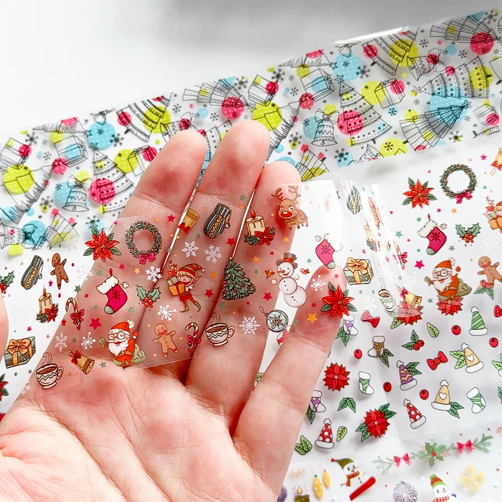 10 rotoli di adesivi per trasferimento di fogli per nail art natalizi, fiocchi di neve colorati, albero di Natale, modelli di pupazzo di neve, decalcomanie per unghie, manicure invernale