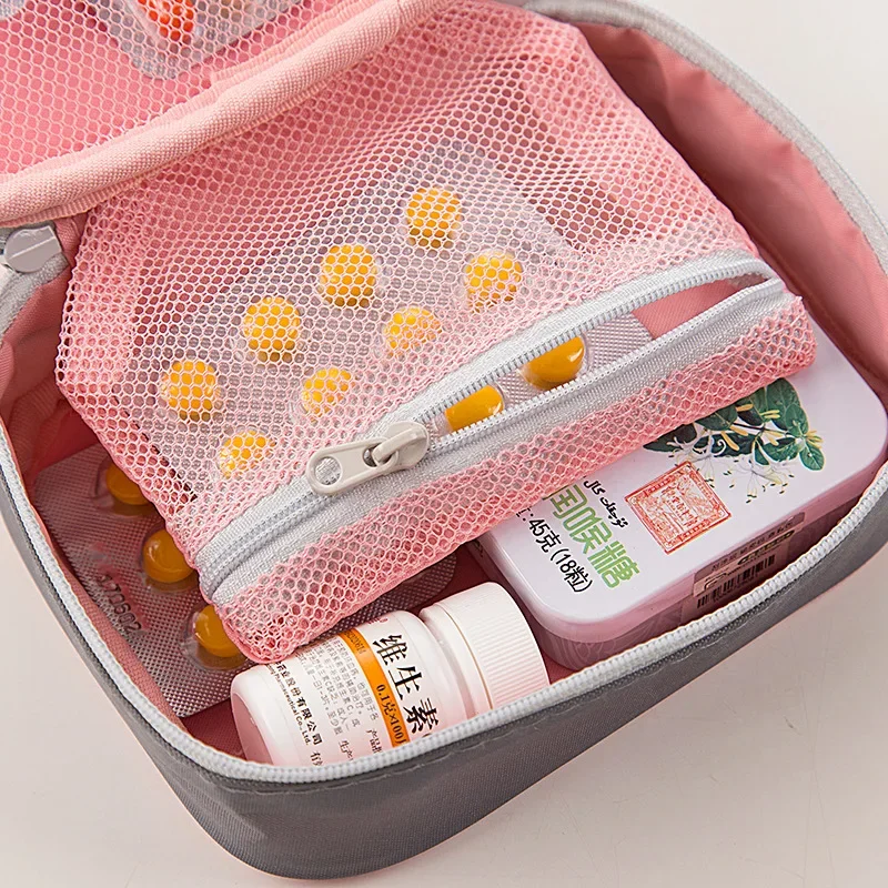 ชุดปฐมพยาบาลกลางแจ้งกระเป๋าเดินทาง Camping แบบพกพา Mini สีชมพู Medical POUCH Pill Storage กระเป๋าชุดการอยู่รอดฉุกเฉิน