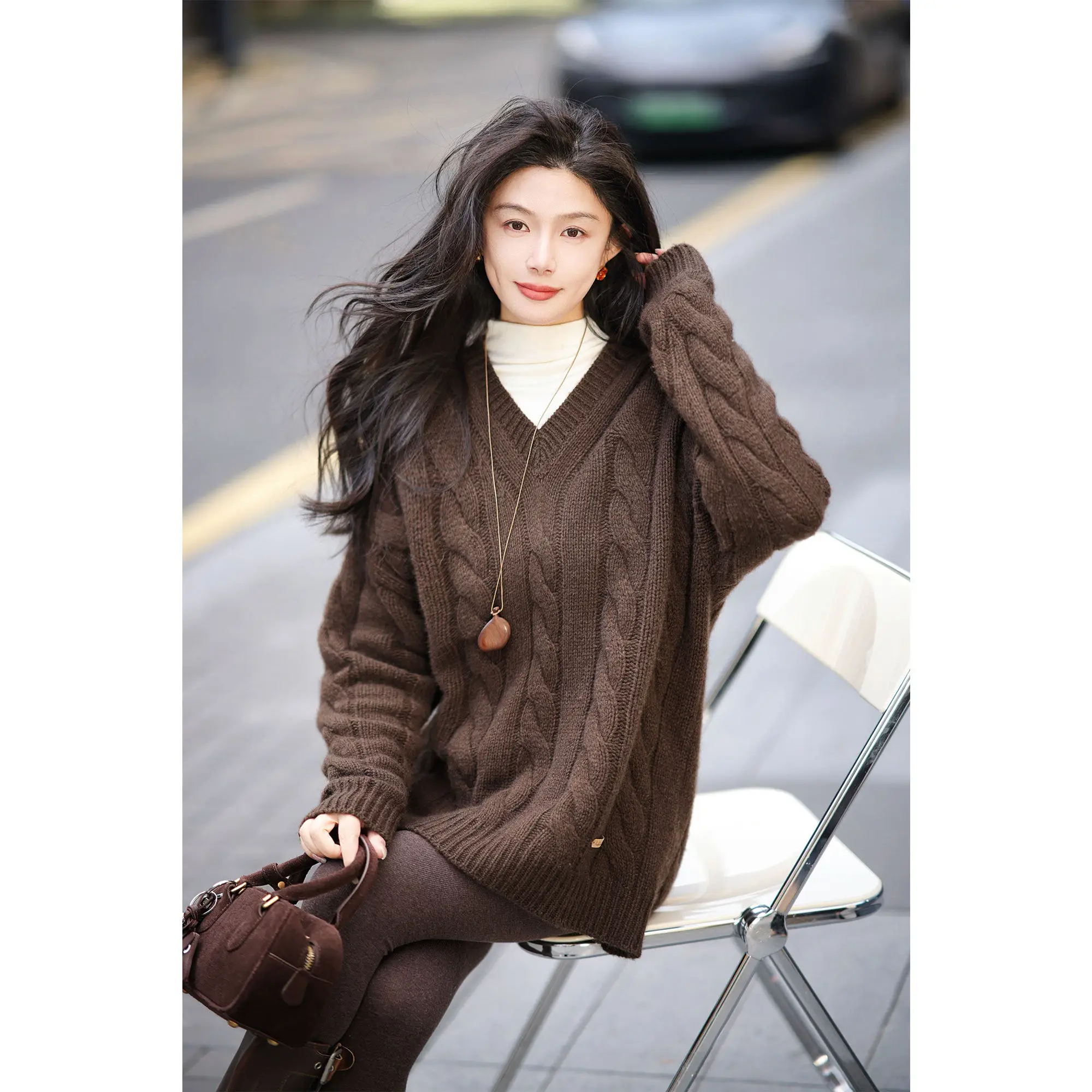 Mid-length sweater ladies cashmere sweater autumn and winter new loose head tassel design sense vertical V-neck twist sweater