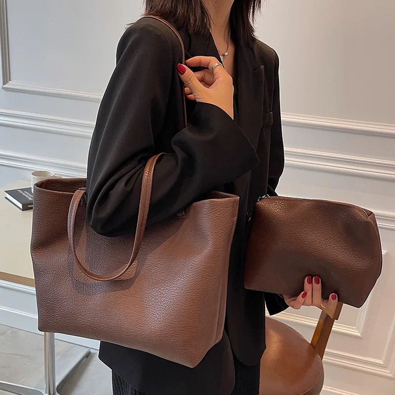 

Korean version of women's new versatile 2026 soft shoulder bag, large capacity high-end commuting tote bag