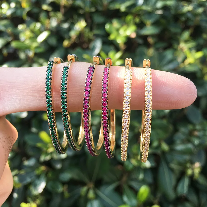 

Популярные женские серьги в европейском и американском стиле, с микроинкрустацией разноцветными циркониями, большие овальные серьги, стильные.