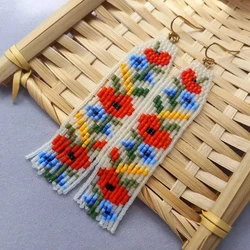Beaded earrings Tassel Flowers Originality Hand knitting Design Bohemia Alloy Fashion Simple Female Rice bead earrings