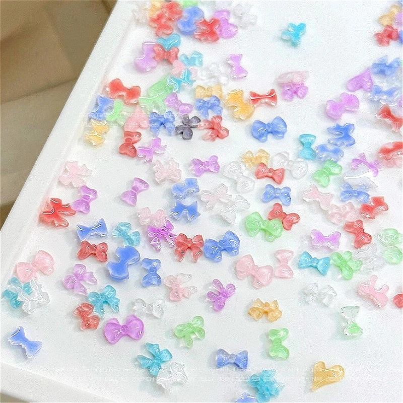 Dulce lazo francés encantador pajarita colorida Linda cinta de resina decoración de uñas DIY manicura accesorios de diamantes de imitación al por mayor
