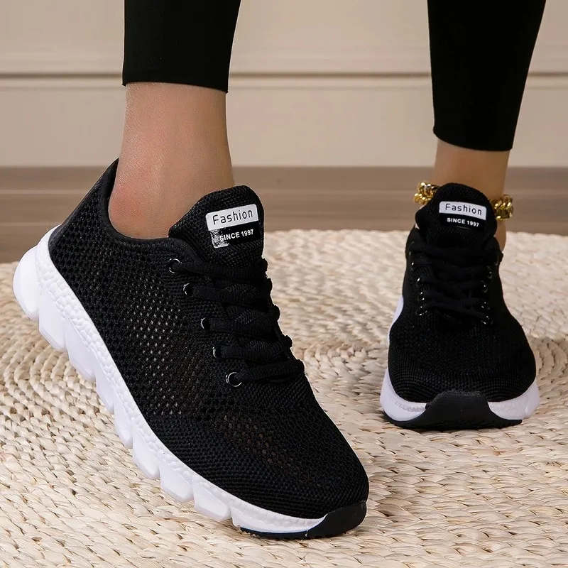 Black mesh lace - up fashion sneakers
