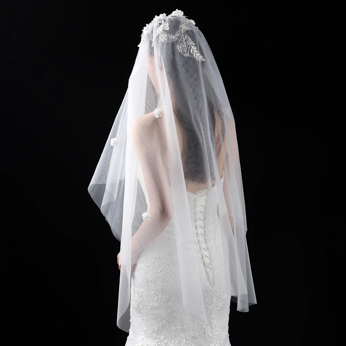 elegant white bridal veil adorned with floral decorations, suitable for waist length women's weddings