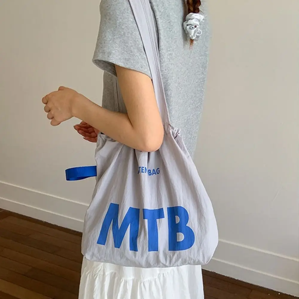 

Simple Solid Color Drawstring Bags Light Weight Large Capacity Letter Shoulder Bag Nylon Shopping Tote Bags Ladies