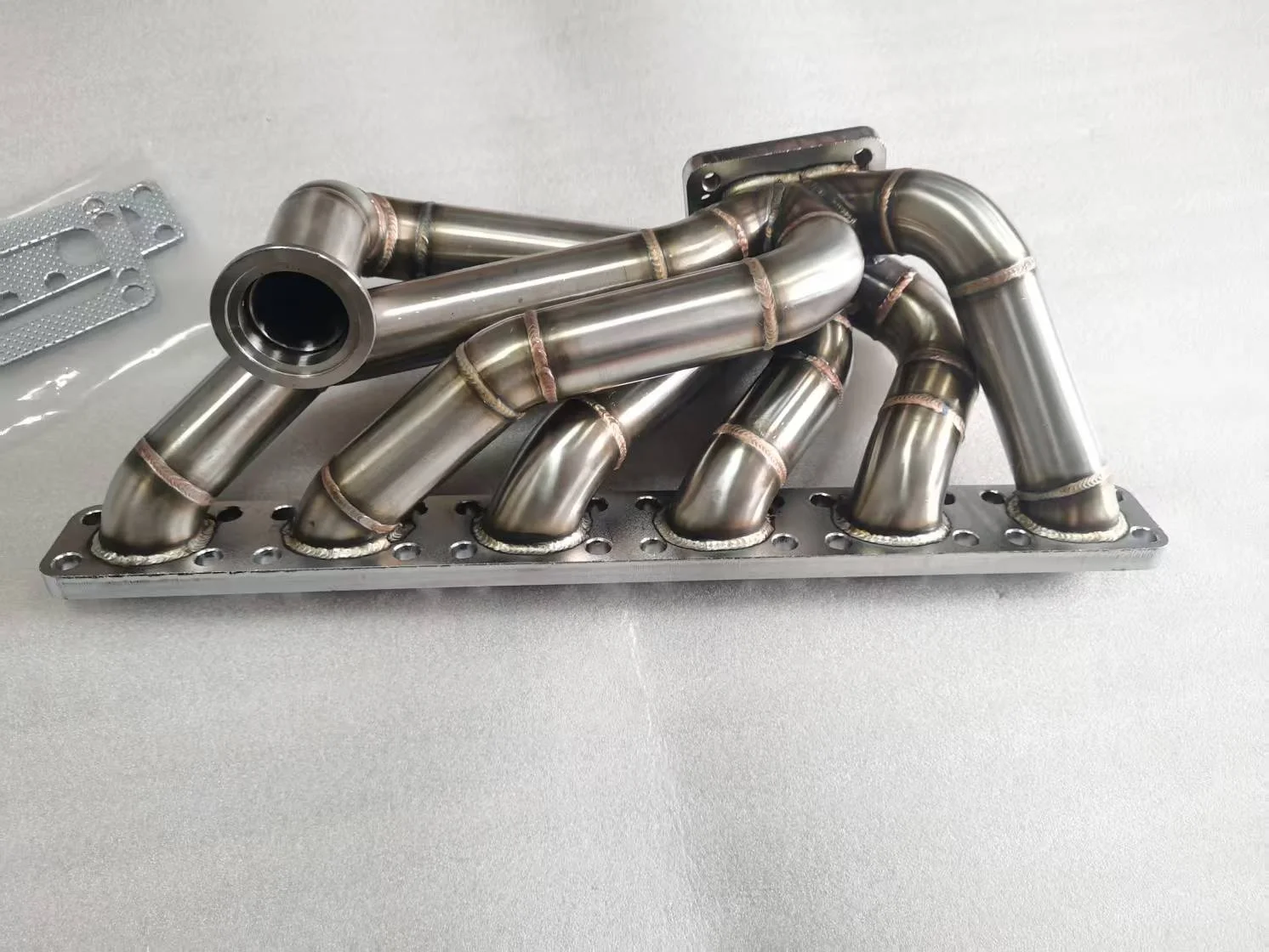 

Турбоколлектор UNILITE из нержавеющей стали SS304 толщиной 3,0 мм, матовый, T3/T4, для BMW E30 E34 24V M50/M52/S50/S52