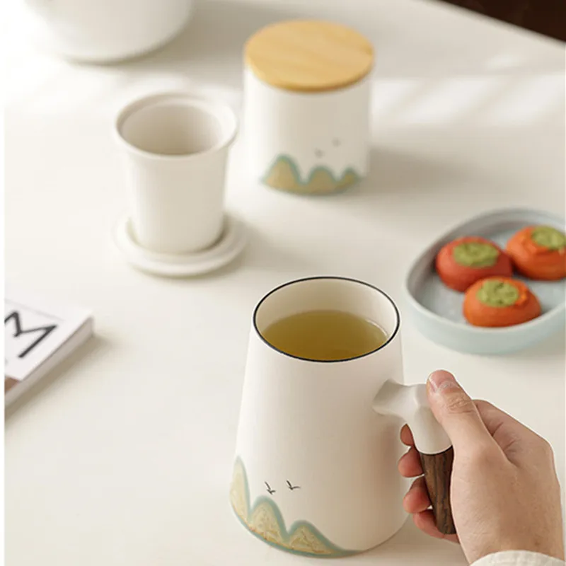 Chinese Ceramic Teacup Mug with Lid and Strainer Handmade Tea Caddy Tea Cup Travel Teaware Tea Water Separation Master Cup