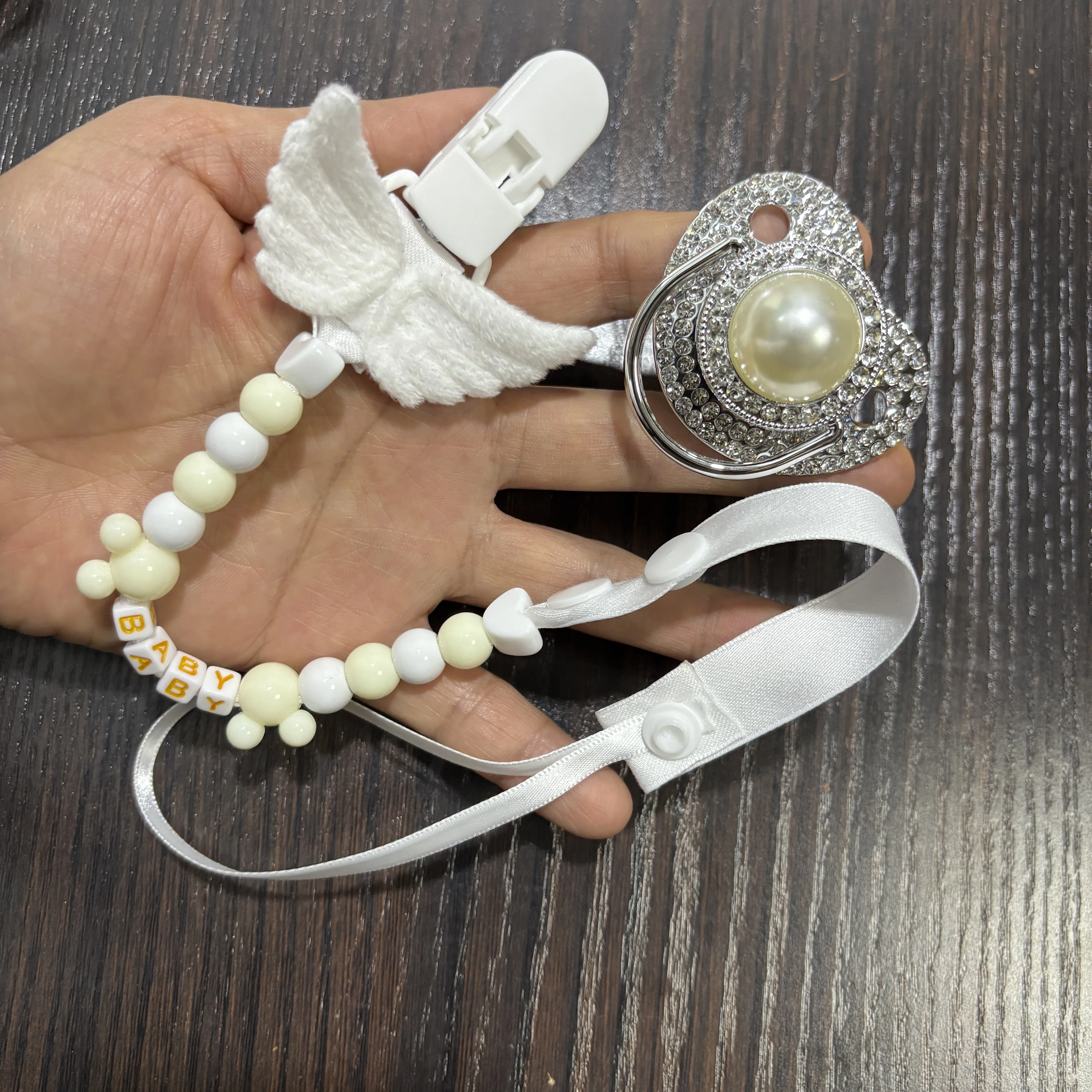 Silicone baby pacifier and convenient pacifier chain set Calms baby's mood Designed with ergonomic shape Comfortable 0-18M