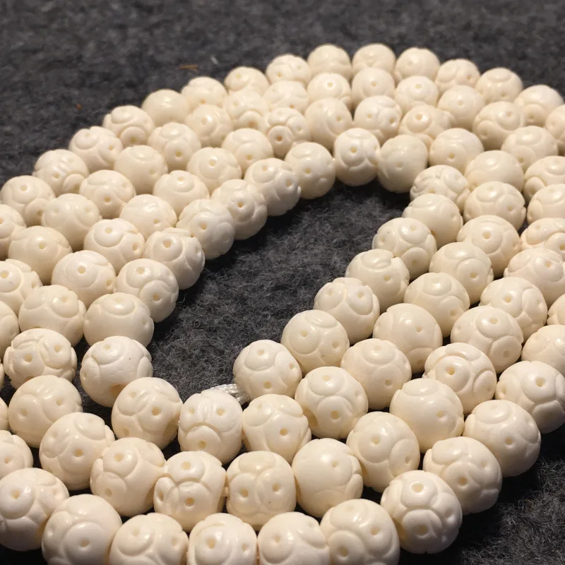 Authentic natural oily deer carved dragonfly eye 108-bead Buddhist bracelet. Prayer beads made of white cow bone, camel bon
