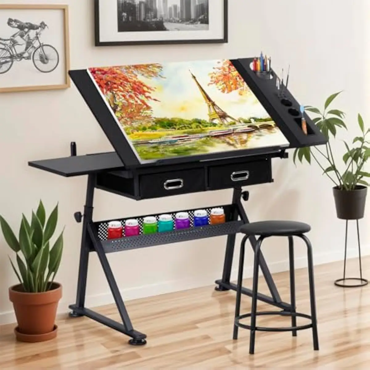 Drafting workstation with tilt-adjustable engineered wood desktop, alloy steel frame, height range 28 to 35.8 inches, 45-degree