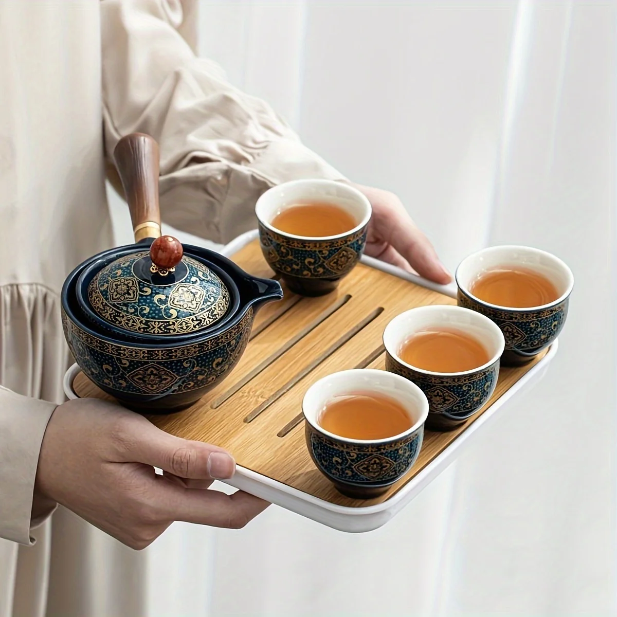 

Tea set with one pot and four cups, creative retro 360-degree rotating home portable kung fu tea set, travel