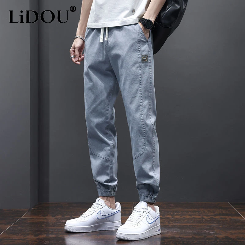 

2023 spring Summer Korean style Haren pants man Solid color Elastic waist Pockets Pencil pants fashion Casual cotton streetwear