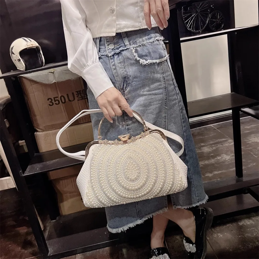 High quality handbag for women in 2023, new niche diamond inlaid shoulder bag, crossbody commuting clip, pearl bag for women