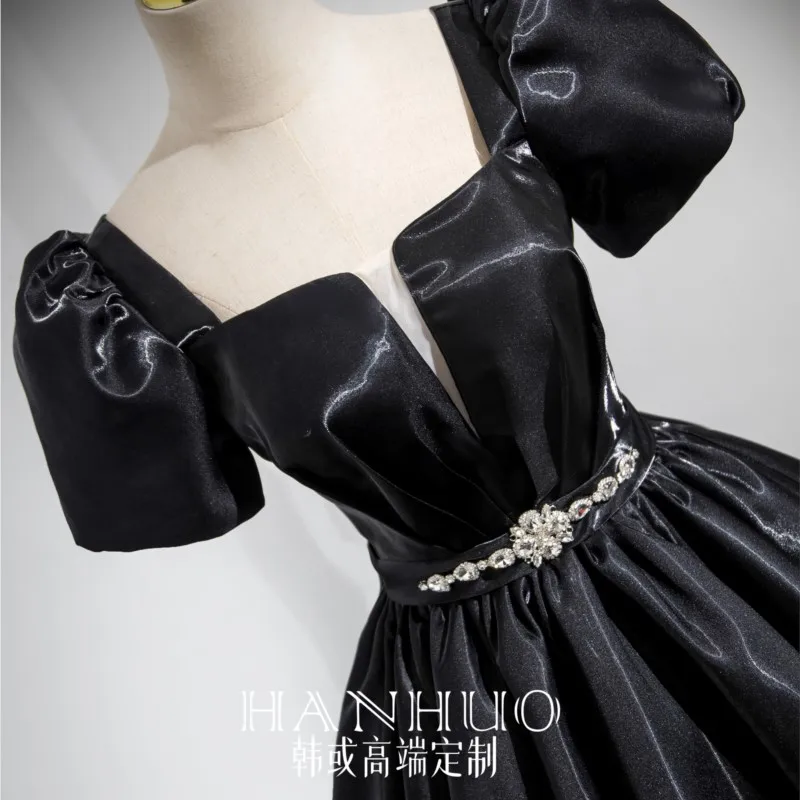 New light luxury adult banquet host dress in black satin