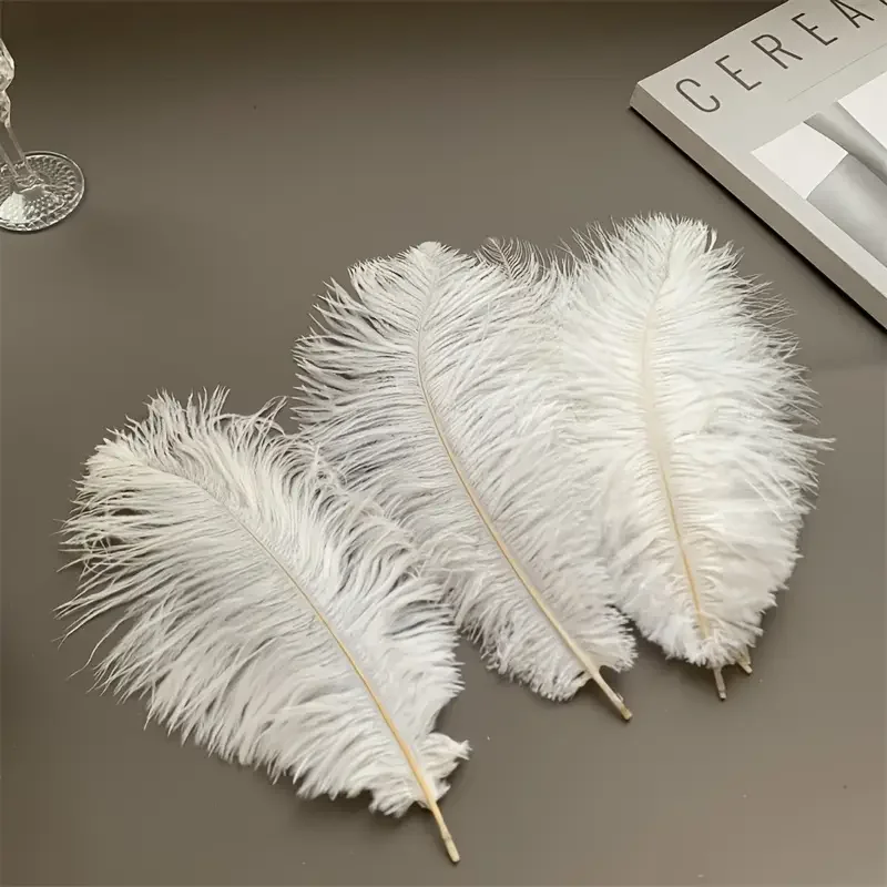 

Оптовая продажа страусиных перьев, центральная часть 45-50 см, горячая распродажа, твердый шест из натуральных страусиных перьев для вечеринки, свадьбы, шитья одежды