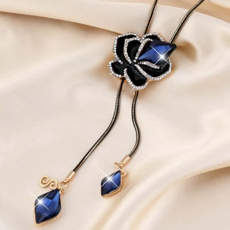 

A long and elegant necklace, an elegant blue rose crystal tassel sweater chain, and a fashionable clothing necklace