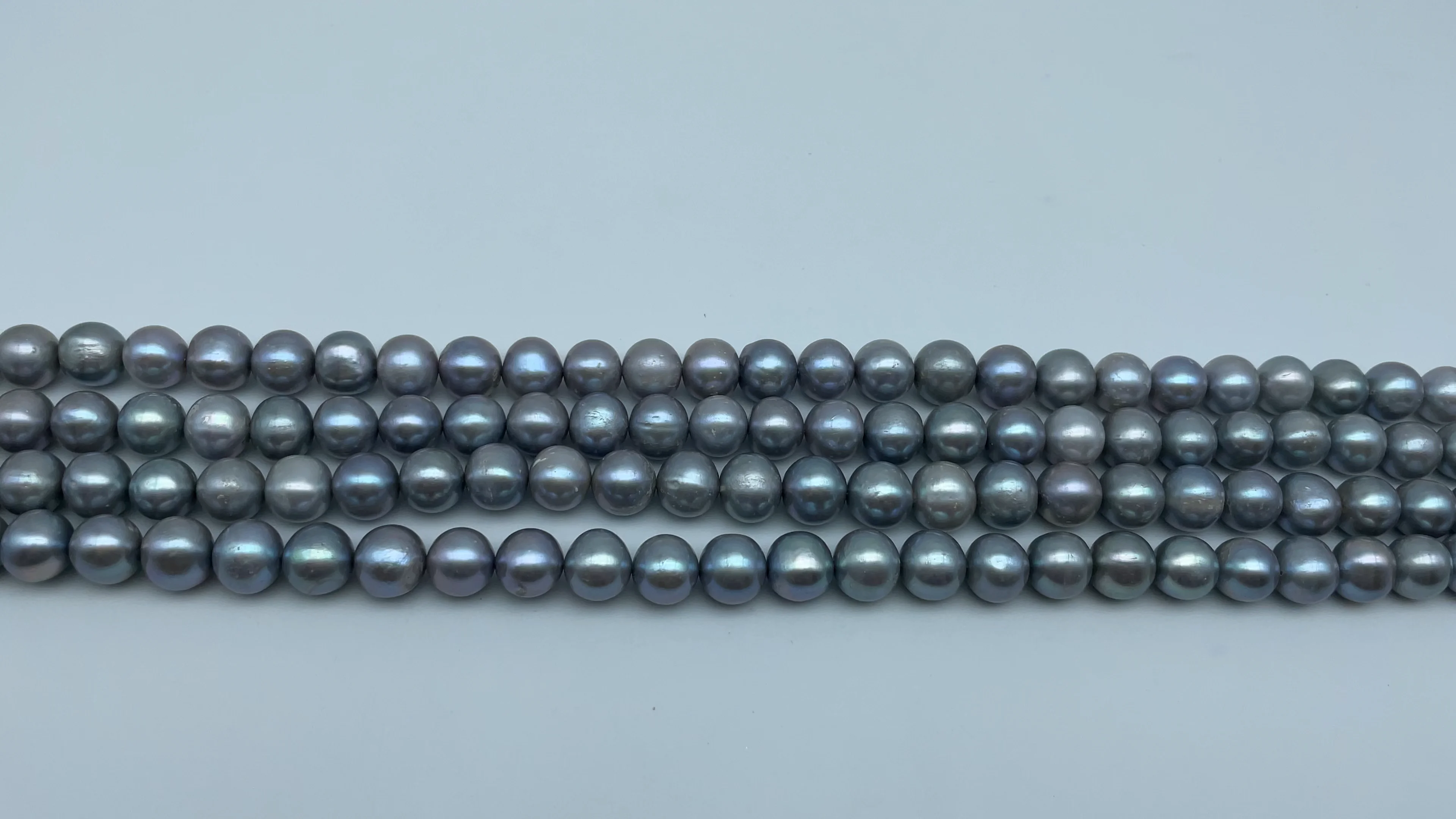 

Natural Color Gray 11-12mm Round Shape Freshwater Pearl Strands Wholesale