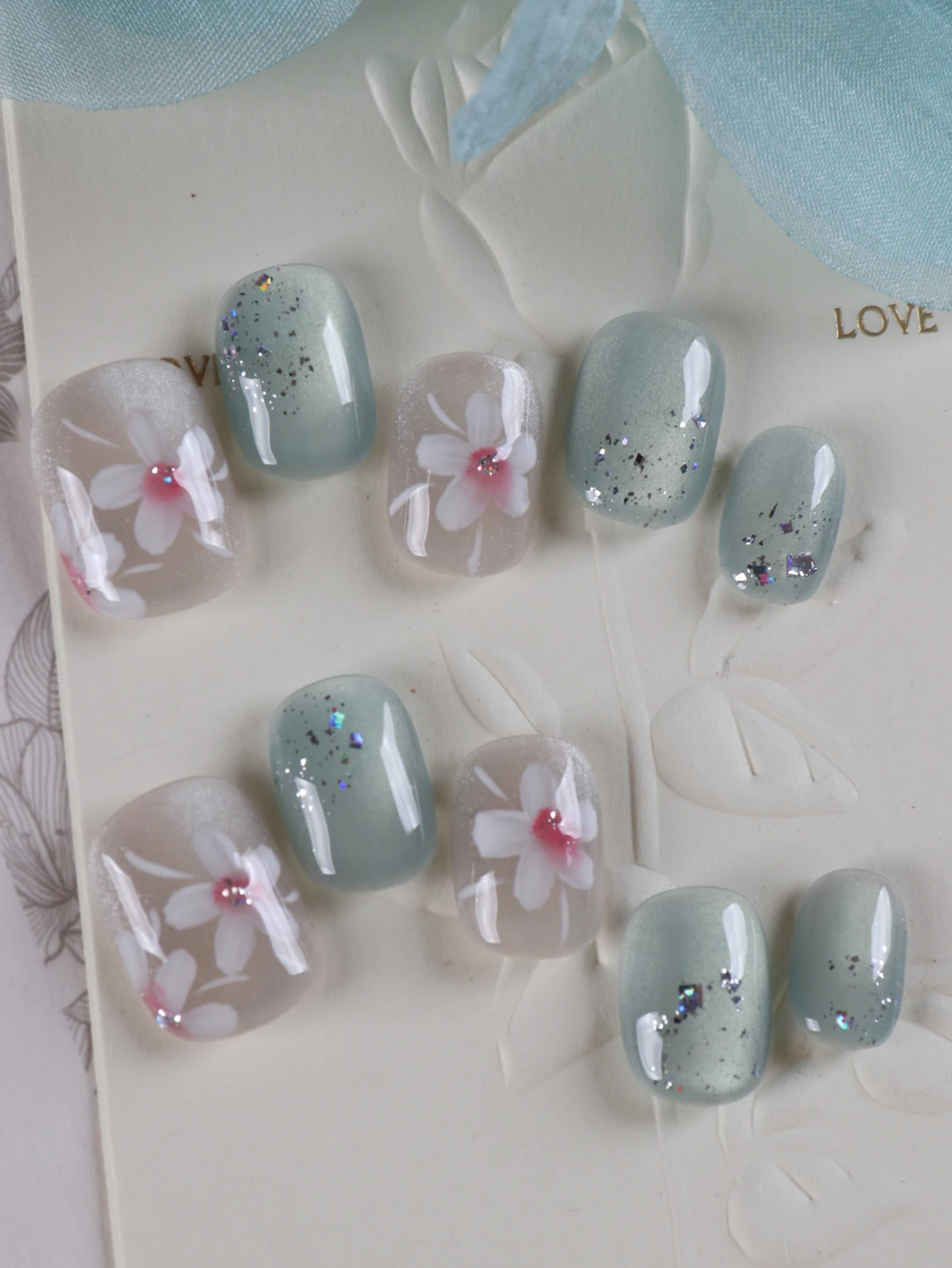 10Pcs Press on Nails  short Blue Cat Eyes white flower nail art Fake Nails Includes 1 Sheet Adhesive Tabs & 1 Pc Mini File