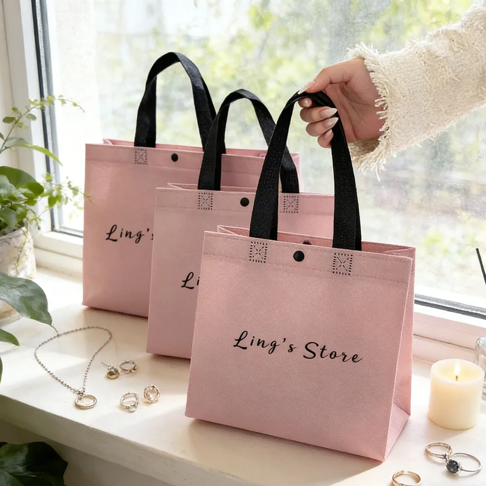 

500 шт. роскошных розовых сумок-тоут из нетканого материала с индивидуальным логотипом для рекламы, свадеб, ювелирных изделий, компьютеров, подарков, одежды, телефонов