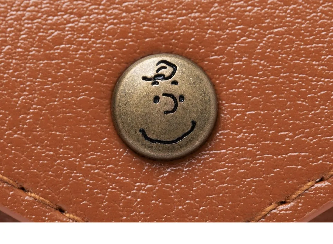 Portfel unisex Snoopy, składany na trzy, z ekoskóry, uroczy, wielofunkcyjny portfelik na monety dla kobiet i mężczyzn.