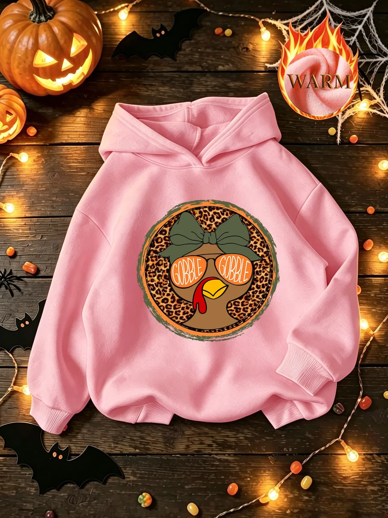 Thanksgiving autumn and winter fashion hoodie. The front features a cartoon chicken pattern and is equipped with a hood design.