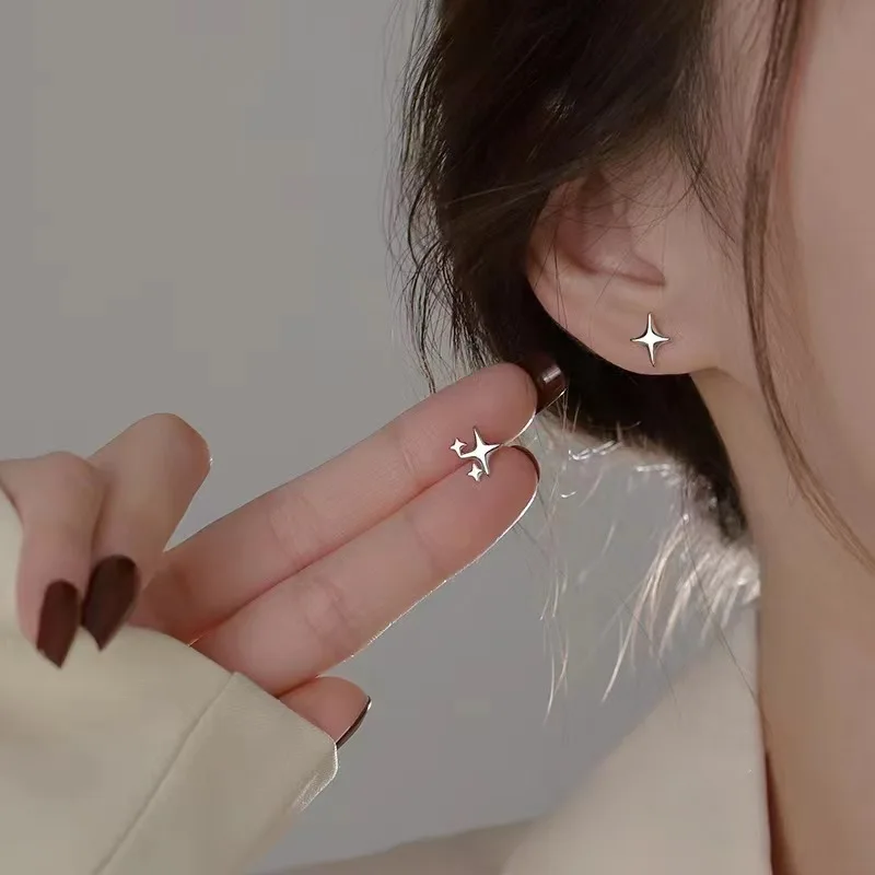 Asymmetric Silver Four Point Star Stud Earrings