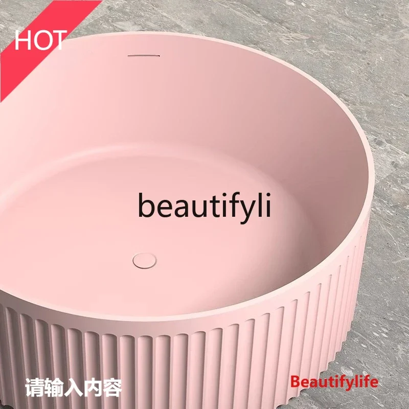 

Pink artificial stone bathtub Free-standing circular vertical striped household color bathtub LHY26