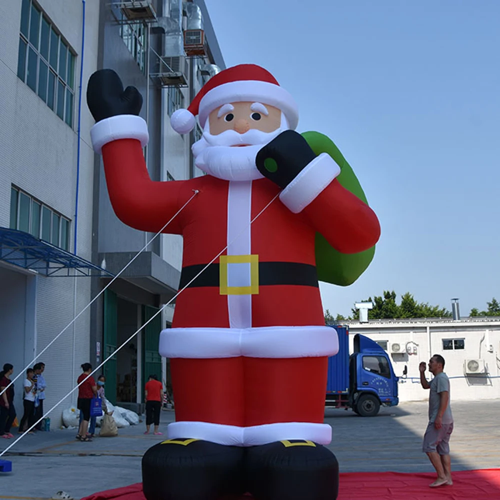 wholesale Popular Giant led inflatable santa Claus with bag decorations for christmas gathering