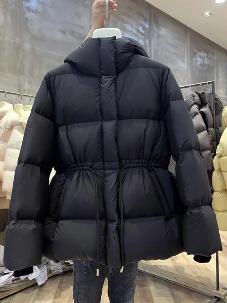   เสื้อโค้ทพัฟเฟอร์ผ้าฝ้ายมีฮู้ดสำหรับผู้หญิง รุ่นเกาหลี ทรงหลวม แขนยาว สไตล์เกาหลี รุ่นบางเบา เหมาะสำหรับฤดูหนาว