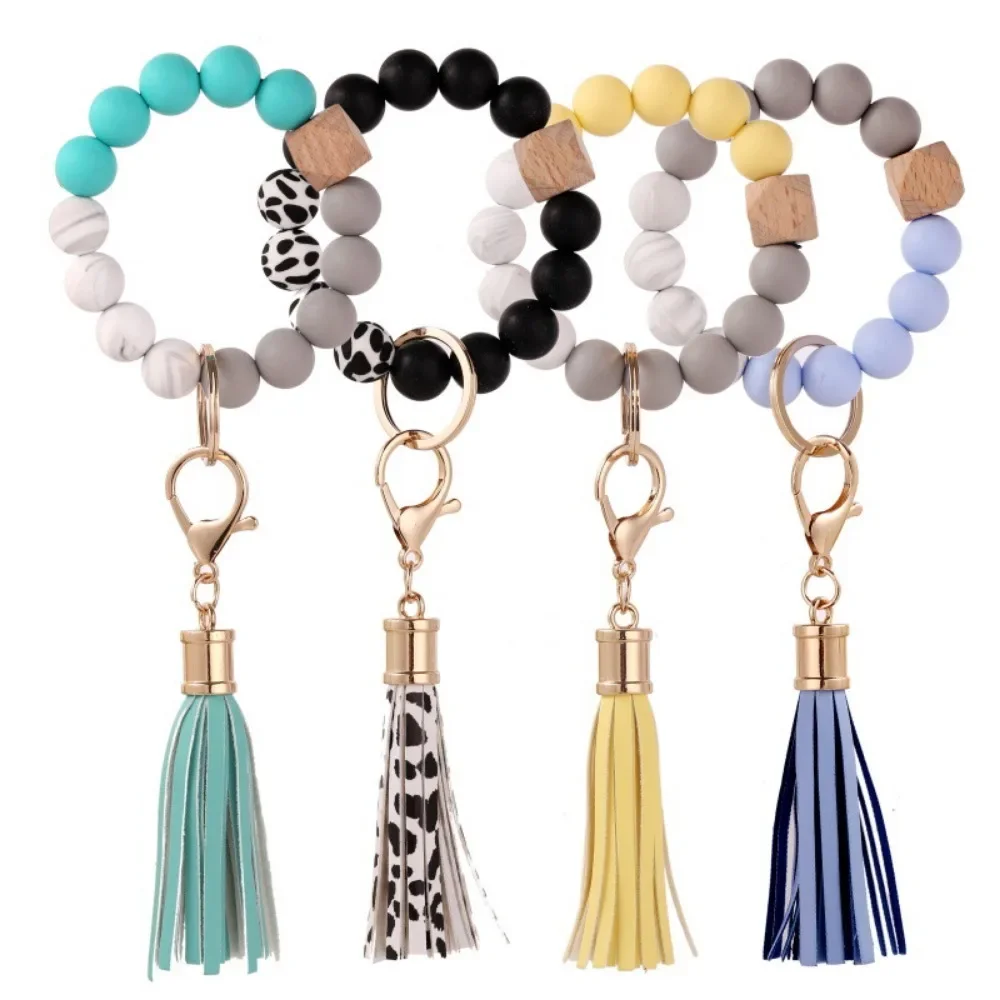 

New Key Ring Silicone Wooden Bead Bracelet Keychain Pendant Anti Loss Car Keyring Quality Tassels Design Wristlet Colorful