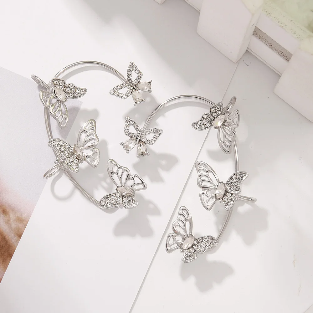 Boucles d'oreilles papillon ajourées, Design exquis, crochet d'oreille unique pour femmes et filles, strass en métal, manchette d'oreille, bijoux en cristal, cadeau