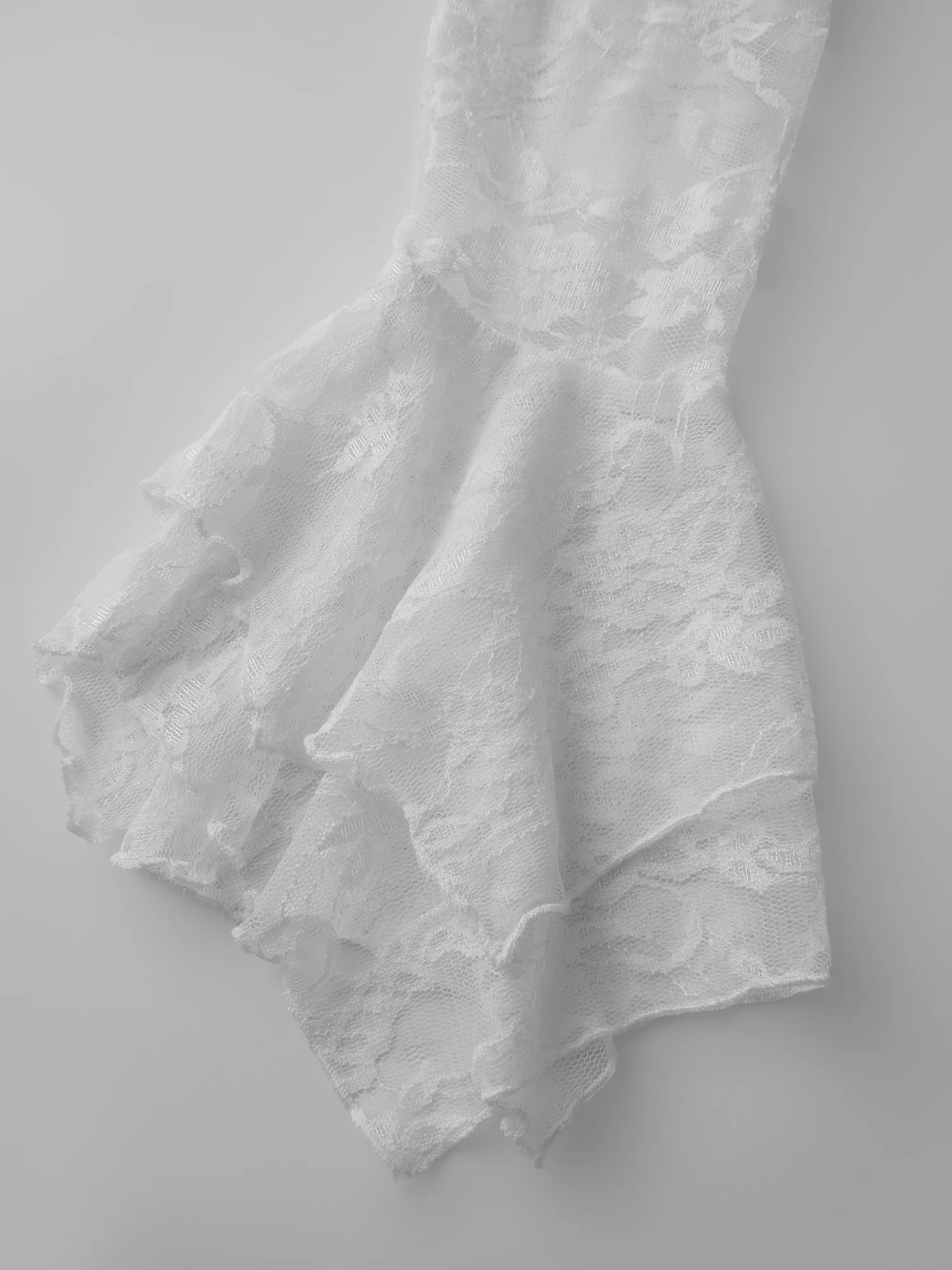 Elegante camicetta da donna in pizzo con scollo a V e maniche lunghe, perfetta per feste e eventi primaverili ed estivi