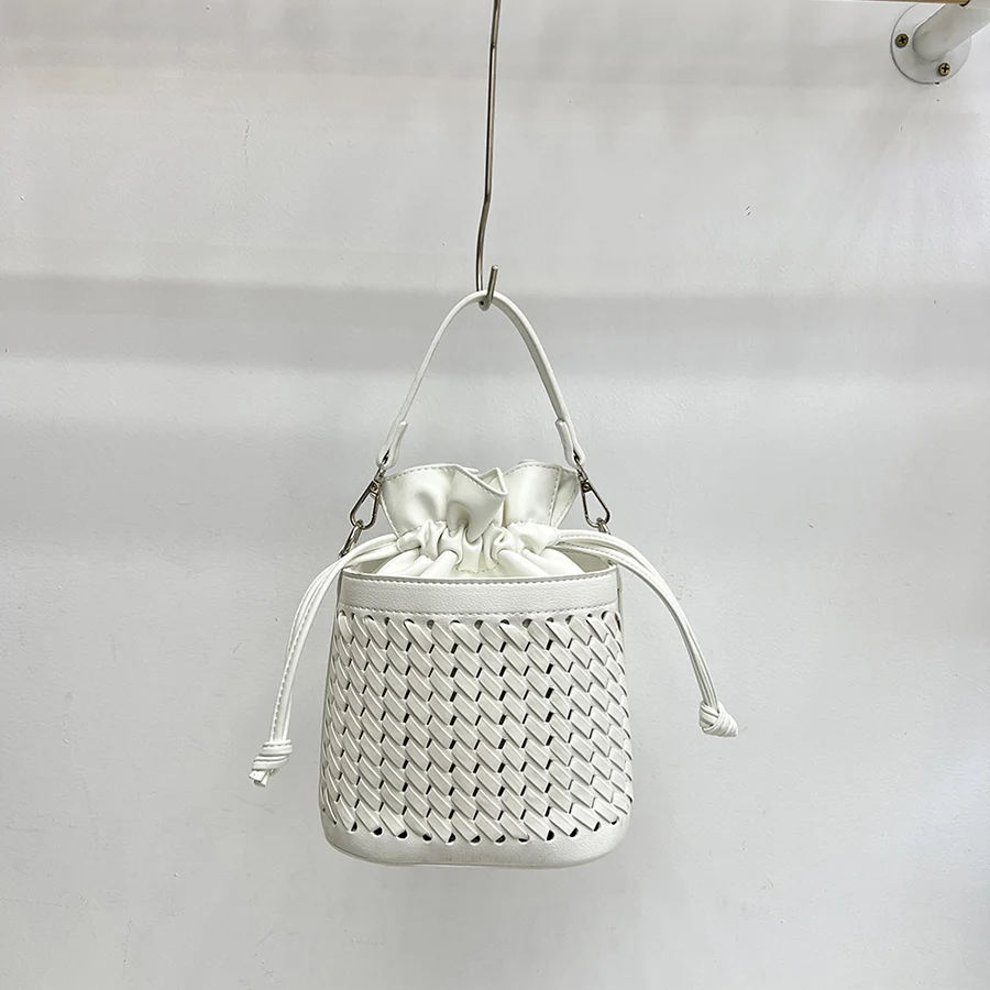 Summer Korea new fashion drawstring bucket bag woven hollow out ladies shoulder crossbody bag female pu leather purse handbags