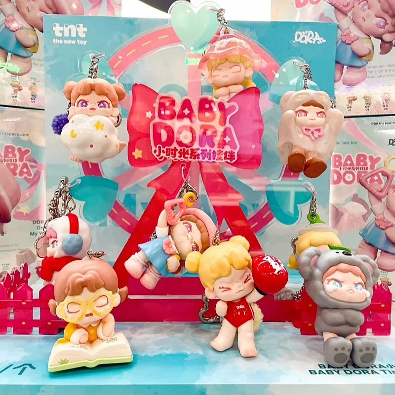 Baby Dora Tiny Time Series Scatola cieca Scatola misteriosa Dora Figura pendente carina Gioco alla moda Ornamento Bambola Regalo di compleanno a sorpresa Giocattolo
