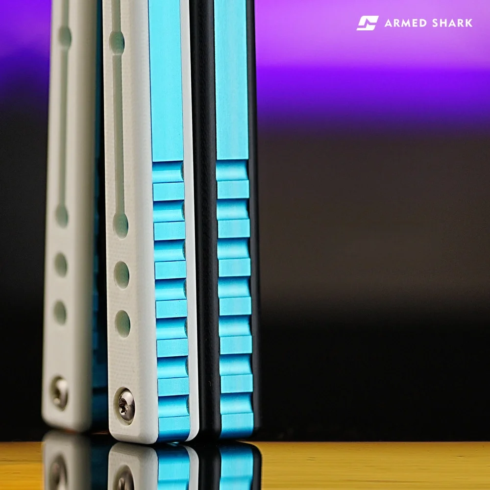 

Classic Armed Shark Nautilus Balisong Trainer, G10/Carbon Fiber Scales + 7075 Aluminum Liners Channel Handle Flipping Tool