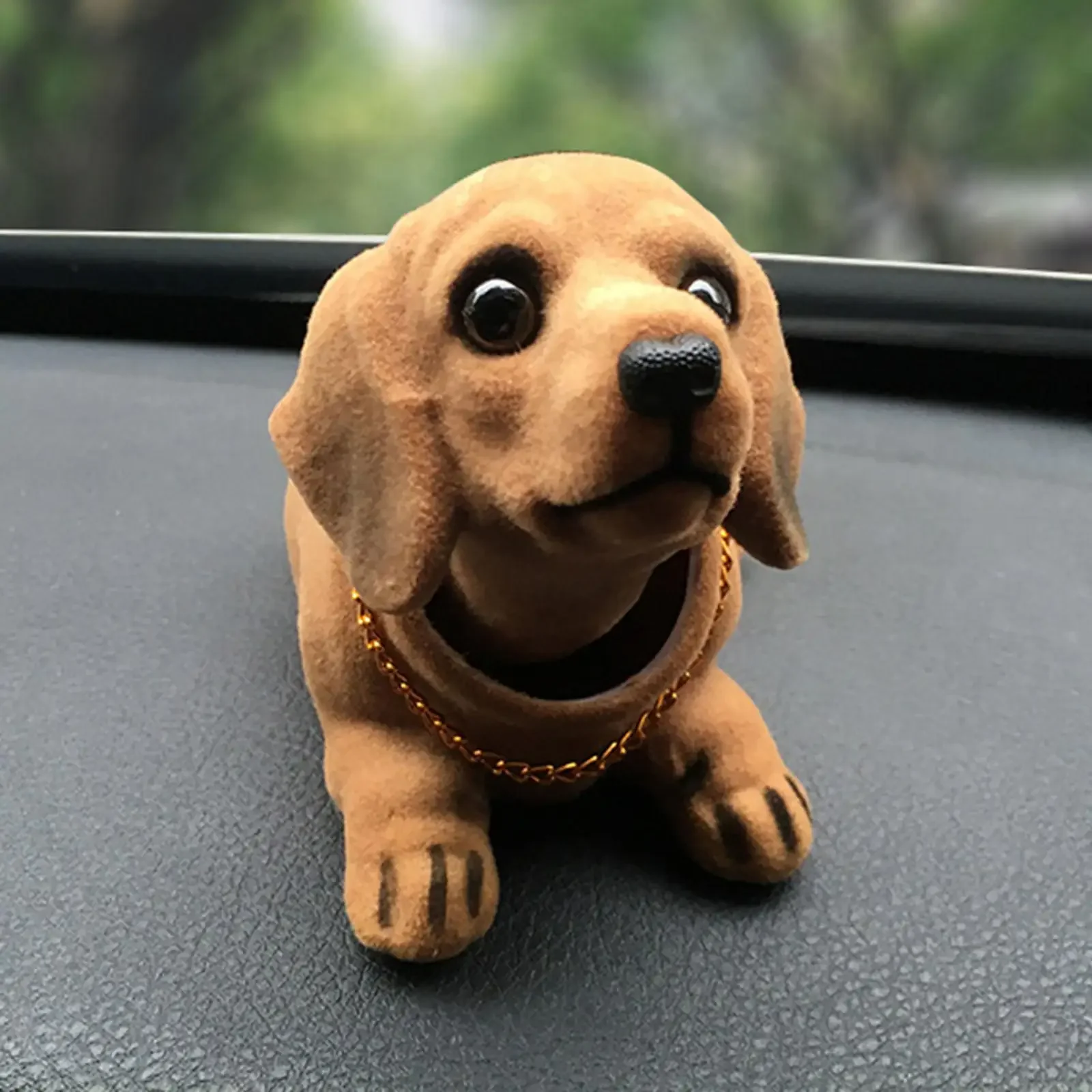 

Adorable Bobble Dog Dashboard Figure – Fun Car Interior Accessory with Nodding Head for Stress Relief