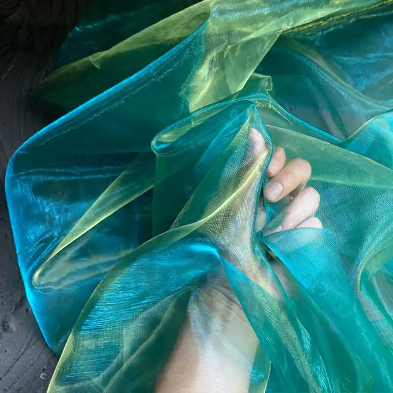 

Blue Green Organza Laser Fabric Yarn Laser Fabric DIY Handmade Clothing Dress Wedding Gradient Color Background Clothing Fabric