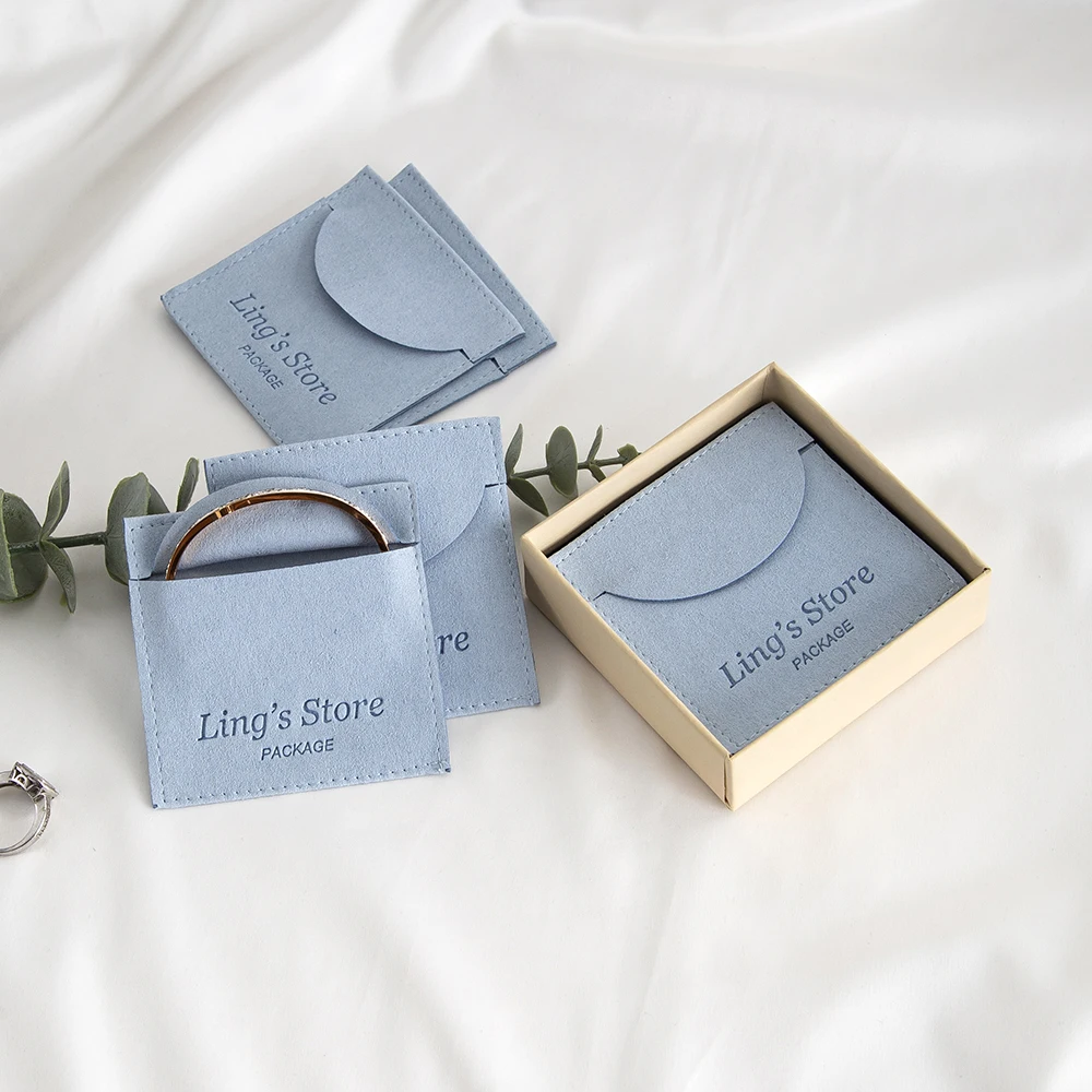 

50Pcs Custom Logo Baby Blue Microfiber Jewelry Storage Bags Stud Earring Ring Charm Necklace Organizer Promotional Gifts Pouches