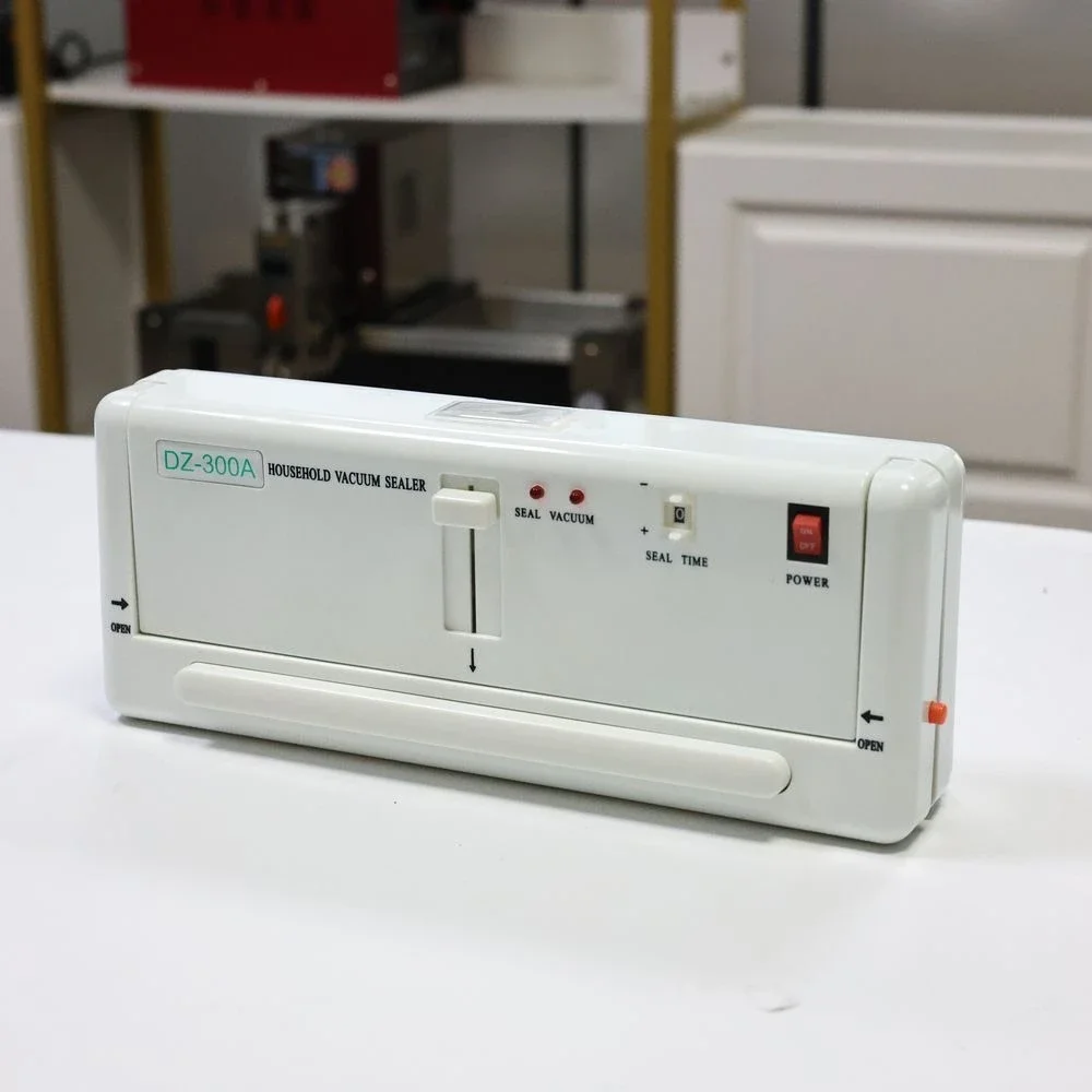 

Household Portable Home Food Vacuum Sealer Aluminium Bag Packing Machine DZ-300A Foodsaver Plastic Bag Heat Sealing Machine